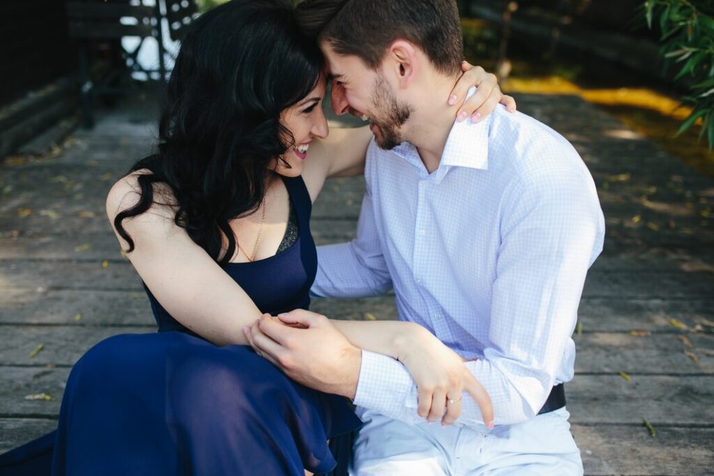 Couple sitting on park road